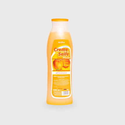 Regina Cremeseife Pfirsich in 1000 ml Flasche, pH-hautneutral, auf hellem Hintergrund zentriert

