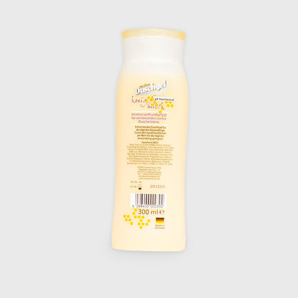 Rückseite der Regina Duschgelflasche Honig & Milch mit Inhaltsstoffen und Produktinformationen, 300 ml

